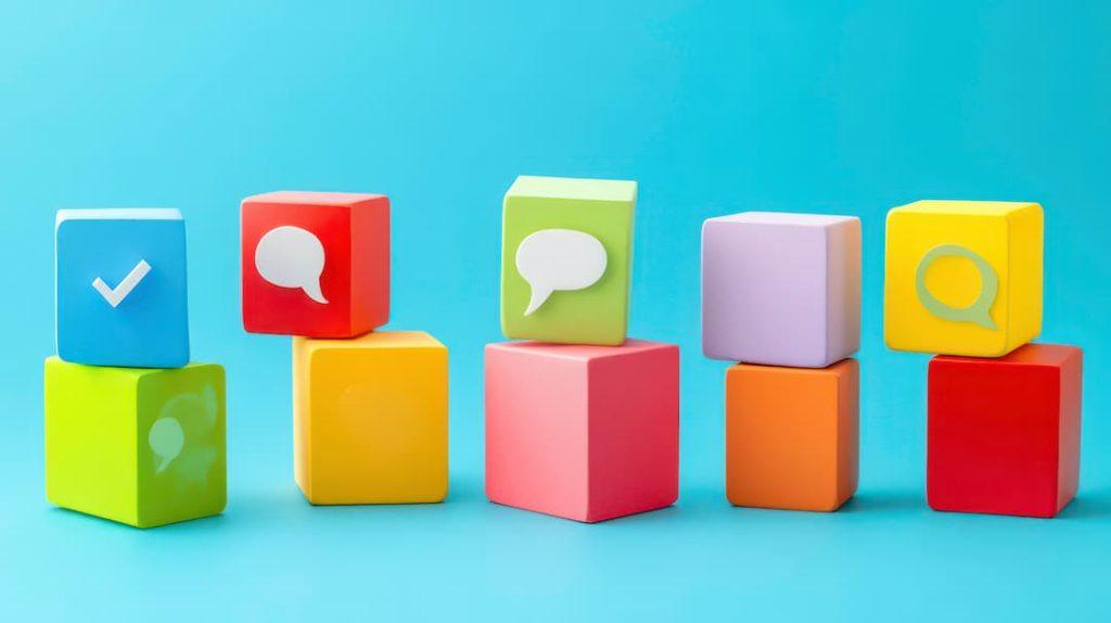 Cubes With Speech On A Blue Background
