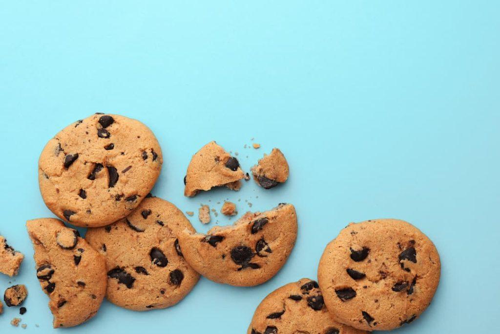 Broken Cookies On Blue Background